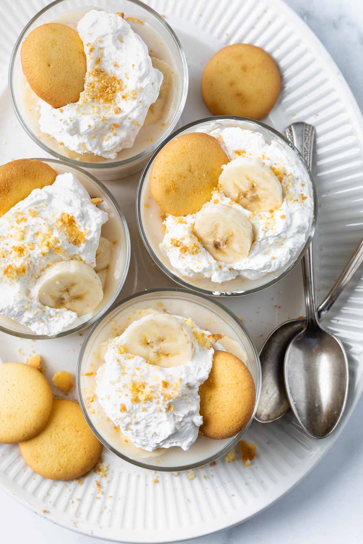 finished banana pudding on white plate with spoons