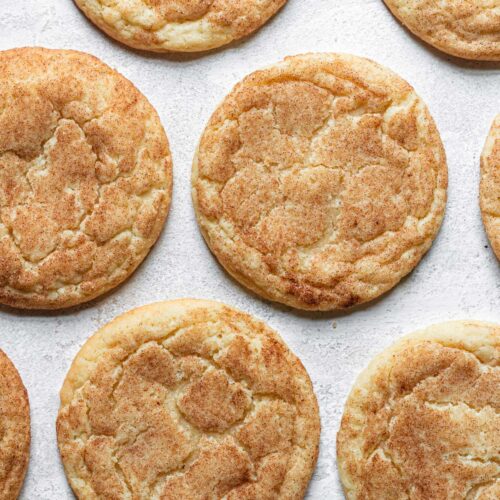 snickerdoodle cookies laying flat on board