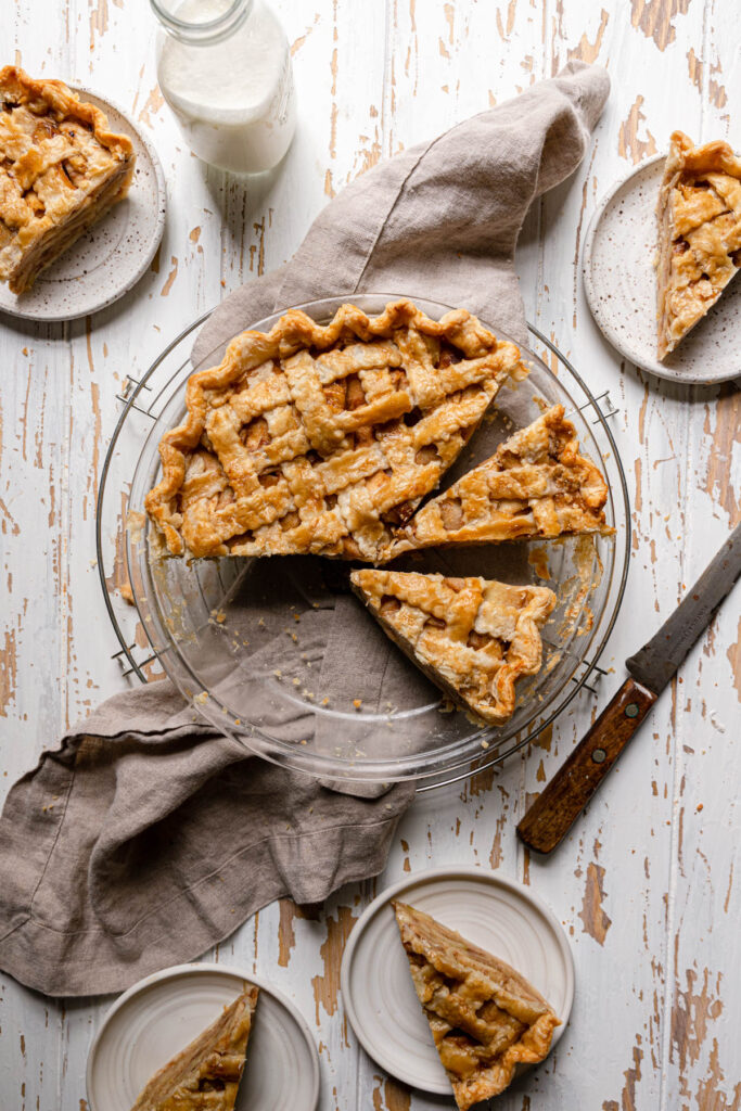 sliced apple pie with many missing slices