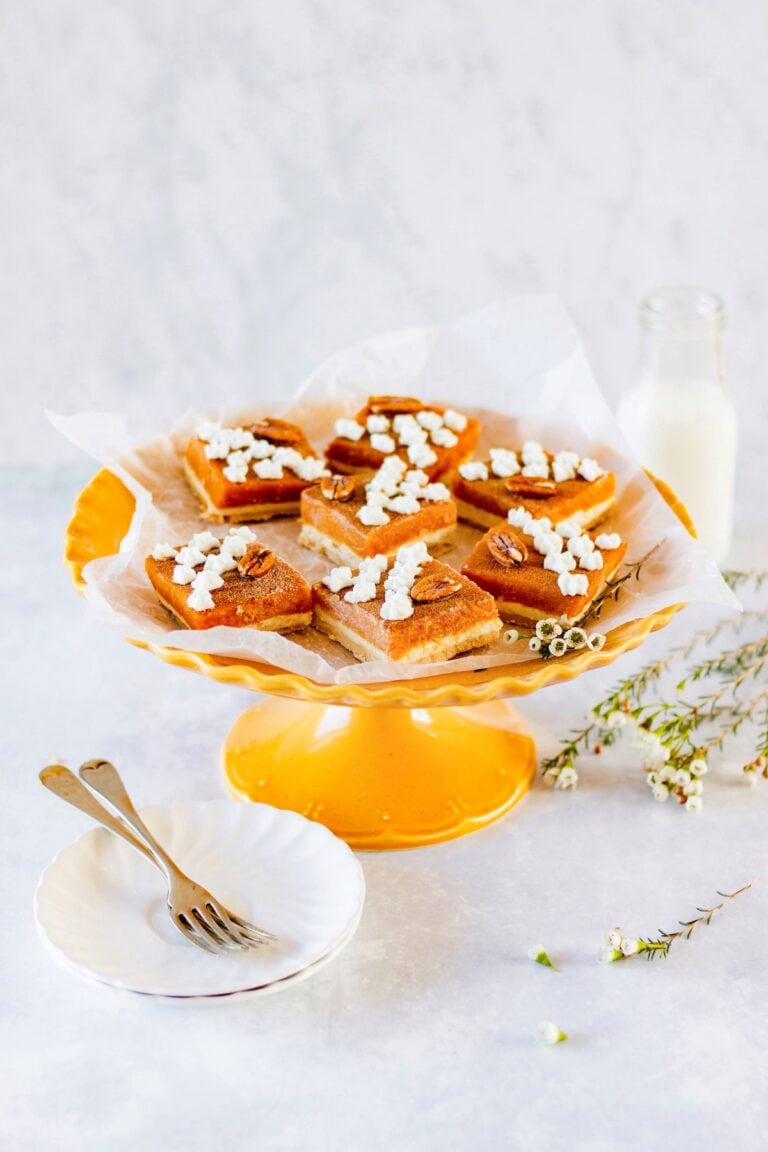 cake stand with pieces of pumpkin dessert lasagna
