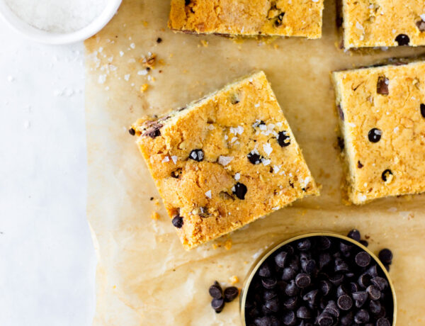 chocolate chip cookie bars on brown parchment paper