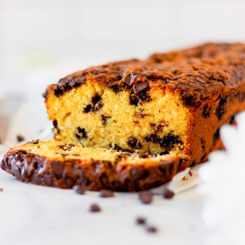 slice and loaf of pumpkin chocolate chip bread