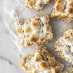 brown butter rice krispie treats on parchment paper