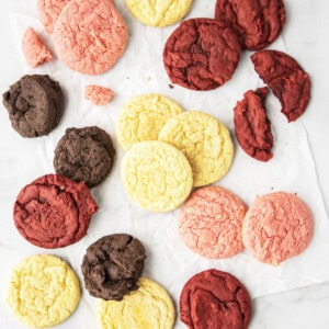 four different cake mix cookies on a counter