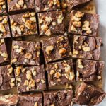 microwave fudge cut up with walnuts on top