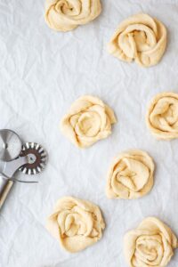 Crescent roll dough rolled into rosettes