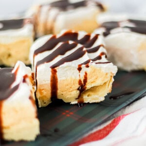 side view of slice of eggnog eclair cake