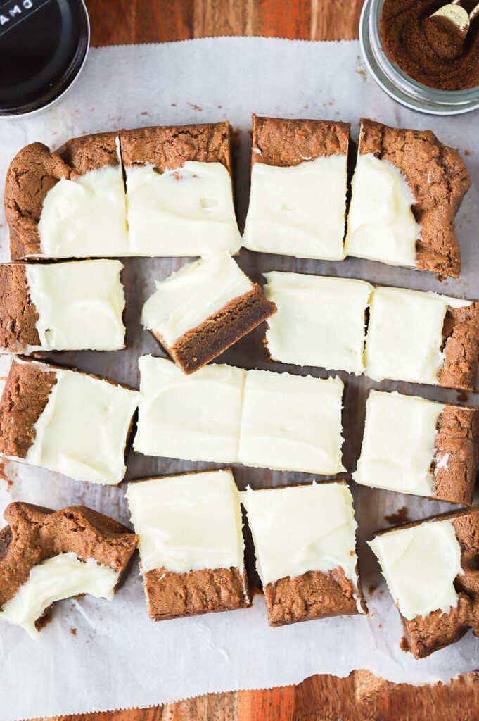 Overhead photo of sliced gingerbread bars with cream cheese frosting