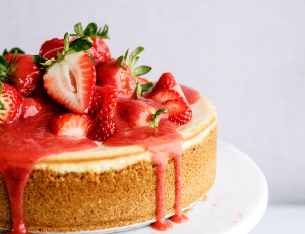 strawberry cheesecake on a cake stand