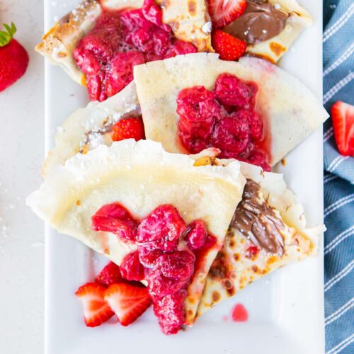 finished nutella crepes with strawberries