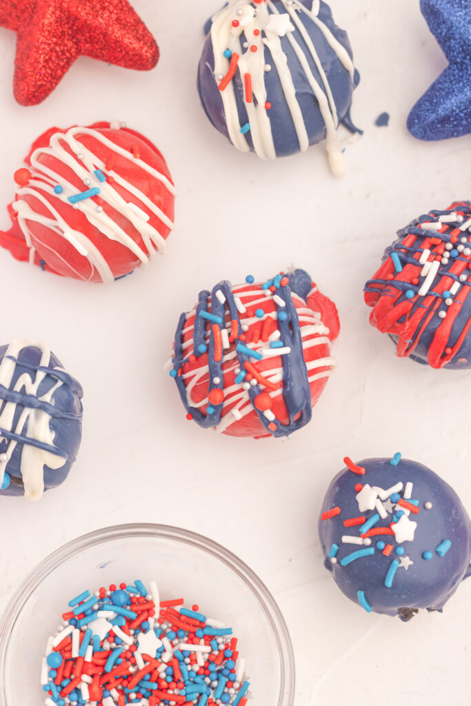 patriotic oreo balls on a white table.
